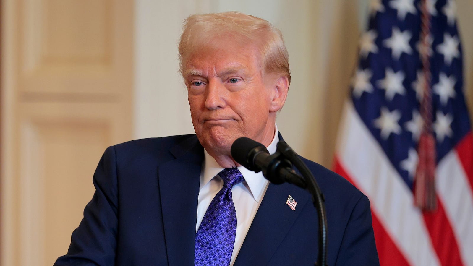 WASHINGTON, DC - JANUARY 29: U.S. President Donald Trump delivers remarks before signing the Laken Riley Act, the first piece of legislation passed during his second term in office, in the East Room of the White House on January 29, 2025 in Washington, DC. Jason Riley and Allyson Philips, the parents of 22-year-old Laken Riley, a University of Georgia nursing student who was murdered in 2024 by an undocumented immigrant, attended the signing ceremony. Among other measures, the law directs law enforcement authorities to detain and deport immigrants who are accused but not yet convicted of specific crimes, if they are in the country illegally. (Photo by Chip Somodevilla/Getty Images)