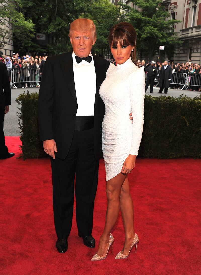 Donald Trump, Melania Trump pose at the 2012 Met Gala red carpet