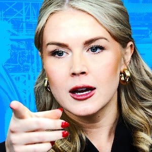 Karoline Leavitt standing in front of the CBS interview of Donald Trump