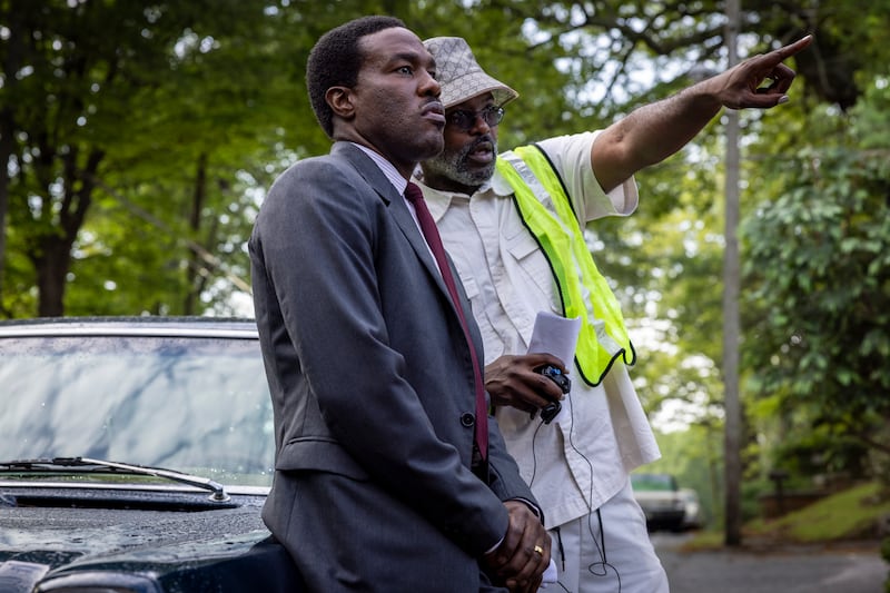 Yahya Abdul-Mateen II, left, and director Elegance Bratton on the set of "By Any Means."