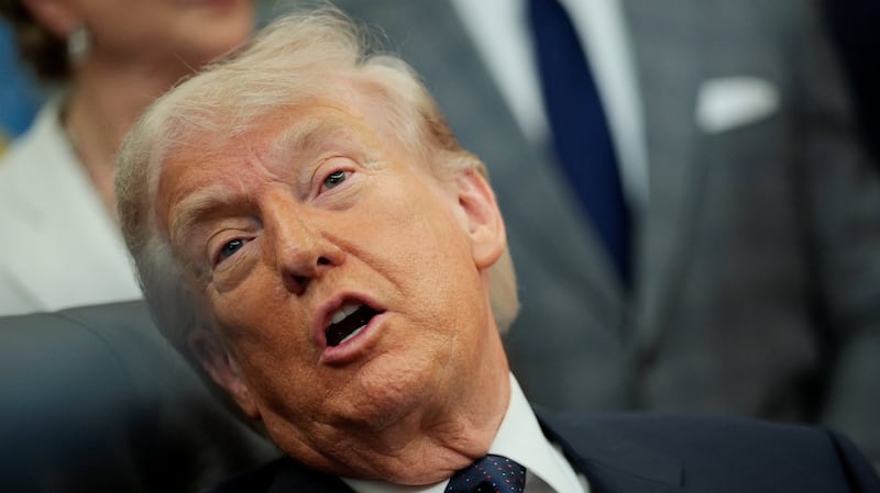 President Donald Trump speaks during an event to sign a memorandum in the Oval Office at the White House in Washington, D.C., U.S., May 5, 2026.