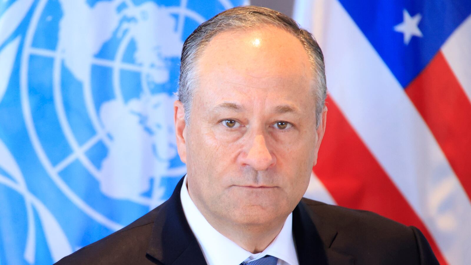 Doug Emhoff has denied claims he slapped a former girlfriend.