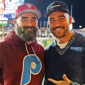 Jason and Travis Kelce pose for a photo during Game 1 of the NLCS between the Arizona Diamondbacks and the Philadelphia Phillies at Citizens Bank Park on Monday, Oct. 16, 2023 in Philadelphia, Pennsylvania.
