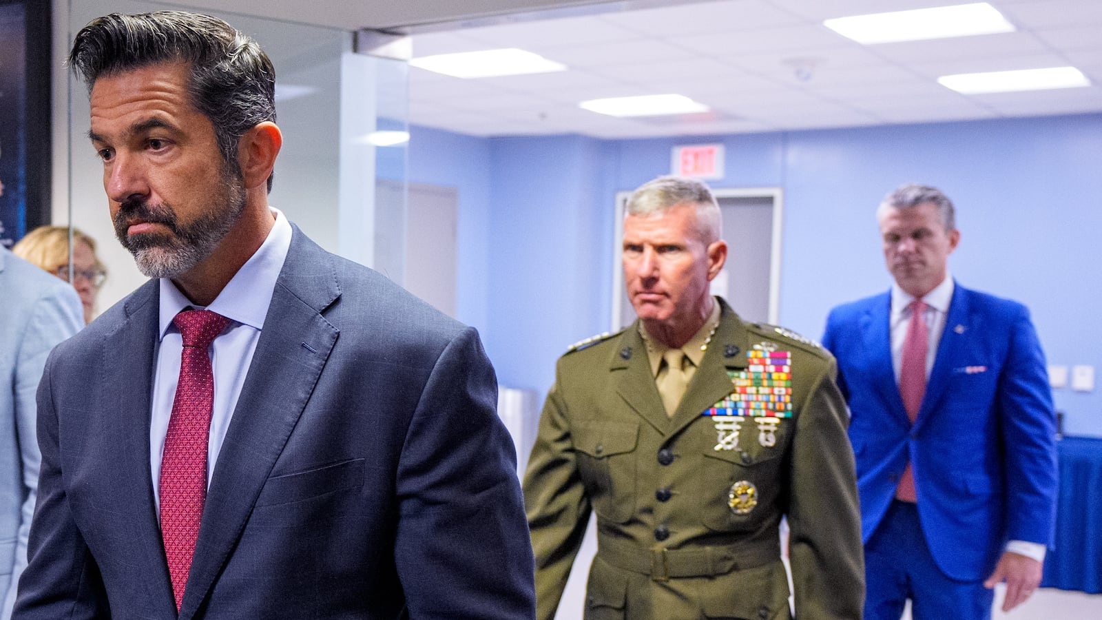 ARLINGTON, VIRGINIA - AUGUST 26: (L-R) Sean Parnell, Chairman of the Afghanistan Withdrawal Special Review Panel and the Chief Pentagon Spokesman, Commandant of the Marine Corps General Eric Smith, and Secretary of War Pete Hegseth arrive for an event to honor Marines who were serving during the 2021 Abbey Gate bombing at the Pentagon on August 26, 2026 in Arlington, Virginia. Three U.S. Marines from Golf Company have their valor awards formally upgraded to honor their heroism and lifesaving actions during the 2021 Abbey Gate bombing at Hamid Karzai International Airport in Kabul. (Photo by Andrew Harnik/Getty Images)