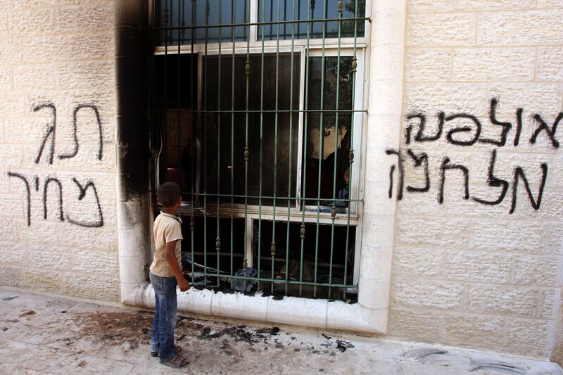 articles/2012/06/29/fearing-public-backlash-israeli-settlers-speak-out-against-their-own/west-bank-mosque-burned-ephron_ybq84v