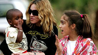 cheats/2009/03/27/its-true-madonna-adopting/madonna-adopting_epigyy
