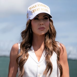 President Donald Trump and Department of Homeland Security Secretary Kristi Noem