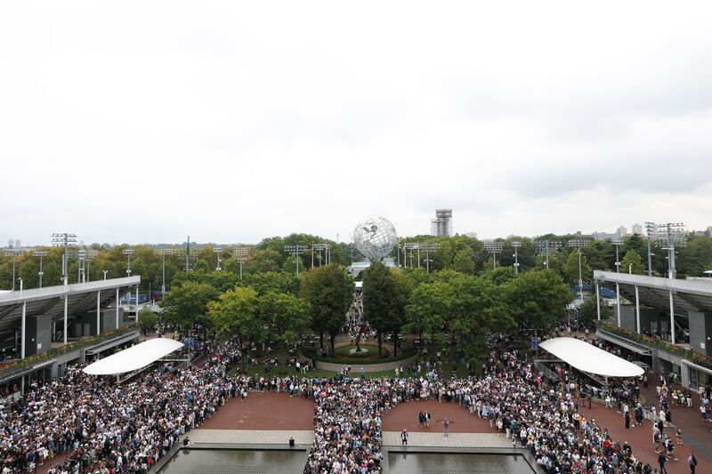 Sep 7, 2025; Flushing, NY, USA;  Fans enter Arthur Ashe stadium prior to the final of men singles between Jannik Sinner (ITA) (not pictured) and Carlos Alcaraz (ESP) (not pictured) at Billie Jean King National Tennis Center.  Mandatory Credit: Mike Frey-Imagn Images