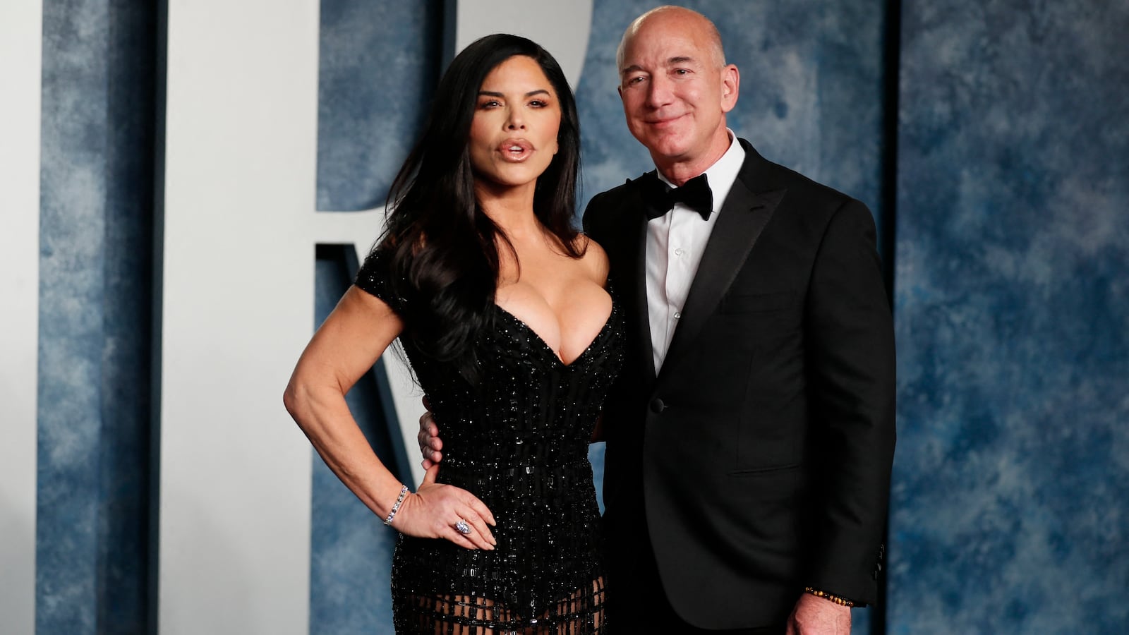 Lauren Sanchez and Jeff Bezos arrive at the Vanity Fair Oscar party after the 95th Academy Awards, in Beverly Hills, California, March 12, 2023.