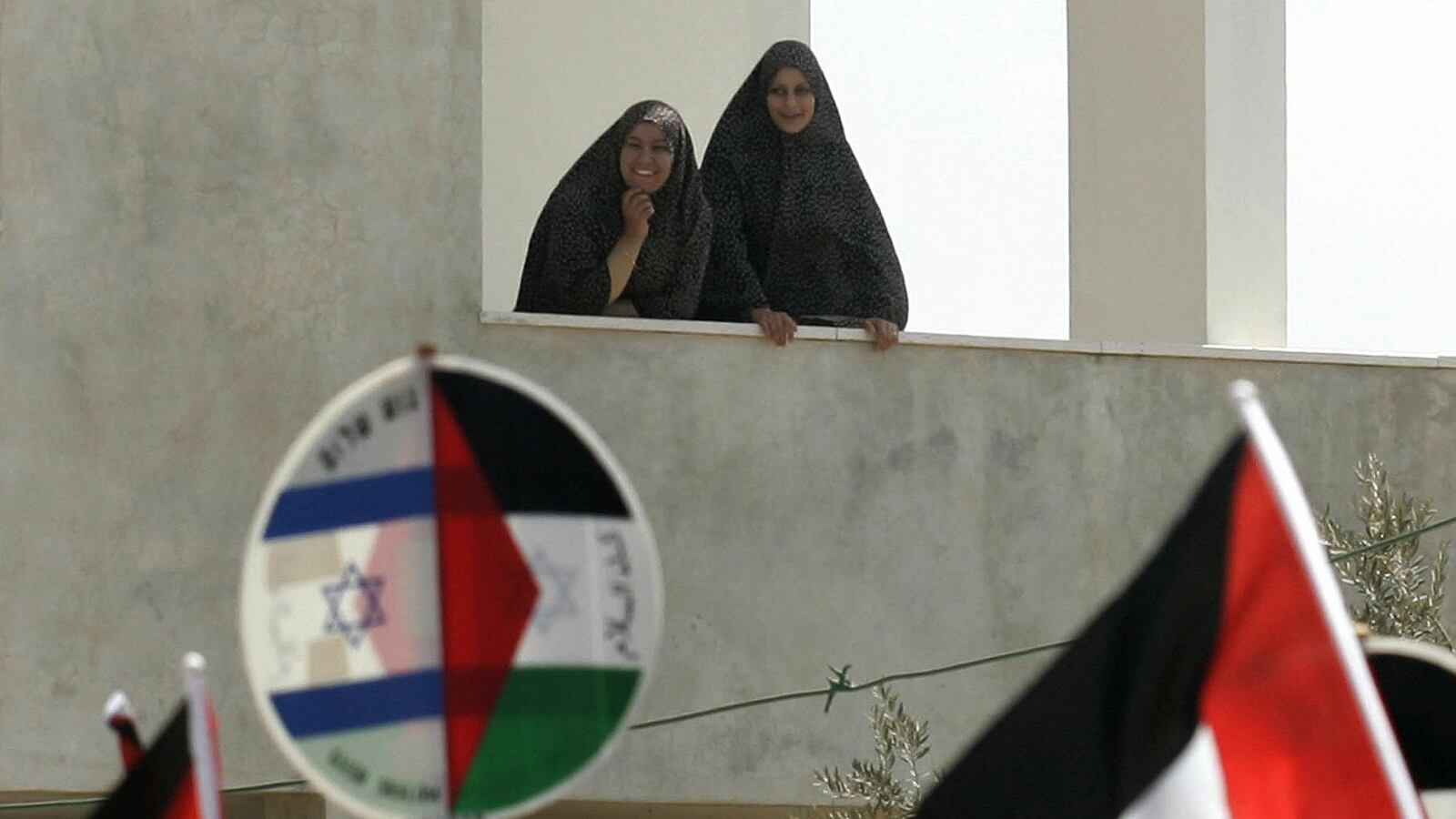 articles/2013/03/05/accusing-each-other-of-genocide/flags-mix-openz_d3fveh