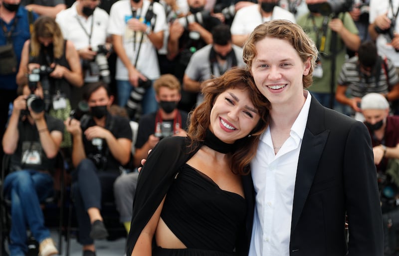 "Val" Coproducers Mercedes Kilmer and Jack Kilmer pose at Cannes 2021