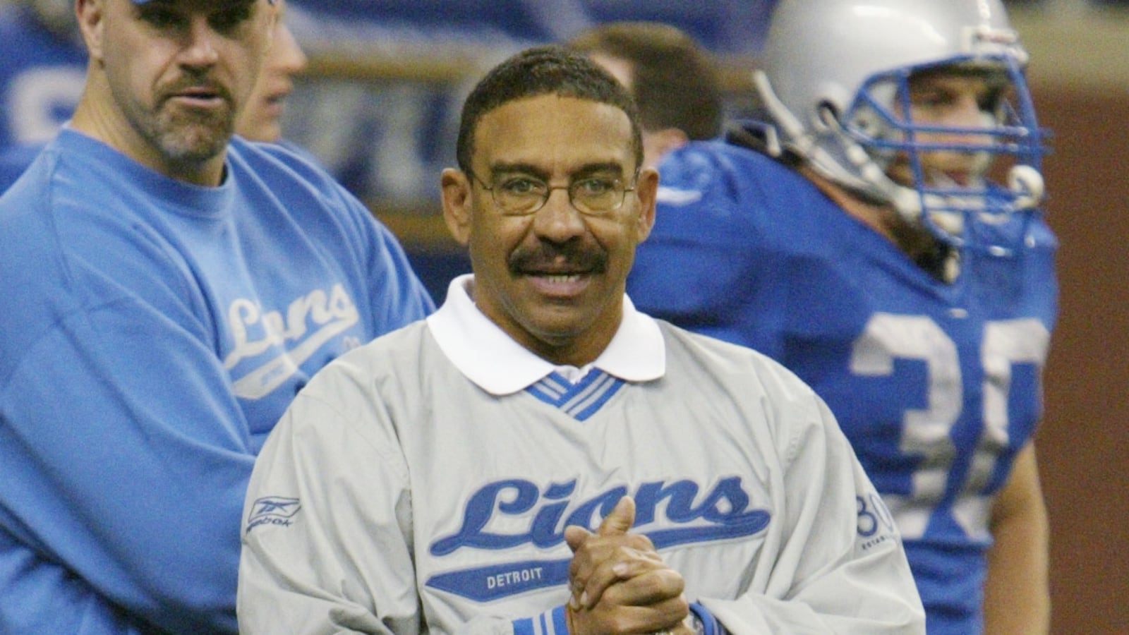Special assistance-offense coach Sherman Lewis of the Detroit Lions watches his team play the New England Patriots on November 28, 2002 at Ford Field in Detroit, Michigan. The Patriots won 20-12.