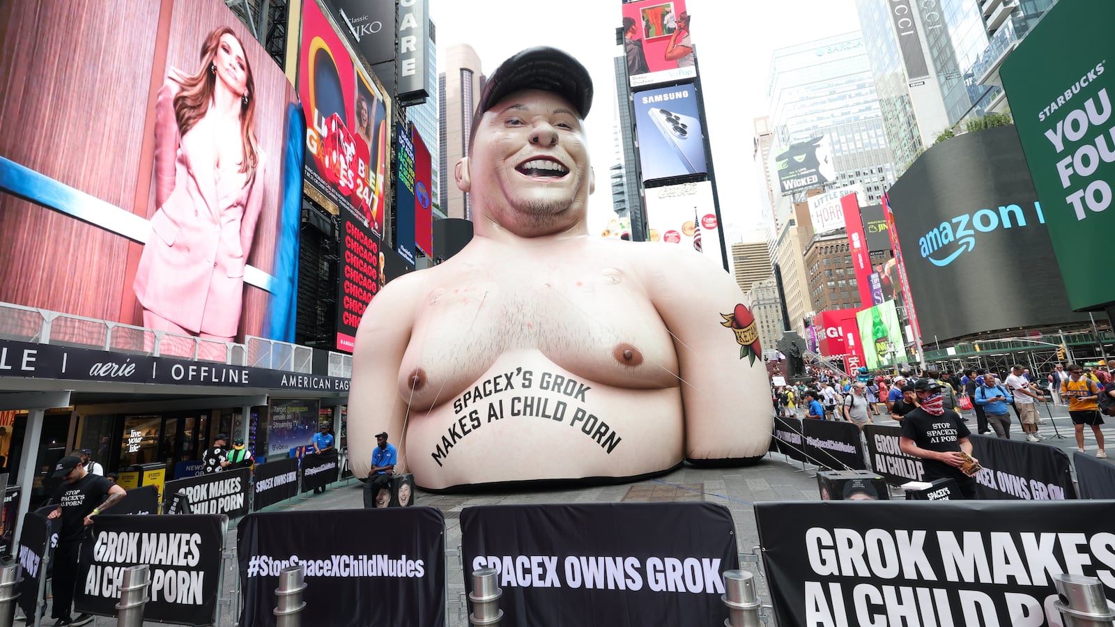 NEW YORK, NEW YORK - JUNE 11: An inflatable statue with the likeness of Elon Musk in Times Square ahead of SpaceX's initial public offering (IPO) on June 11, 2026 in New York City. (Photo by Kevin Mazur/Getty Images)