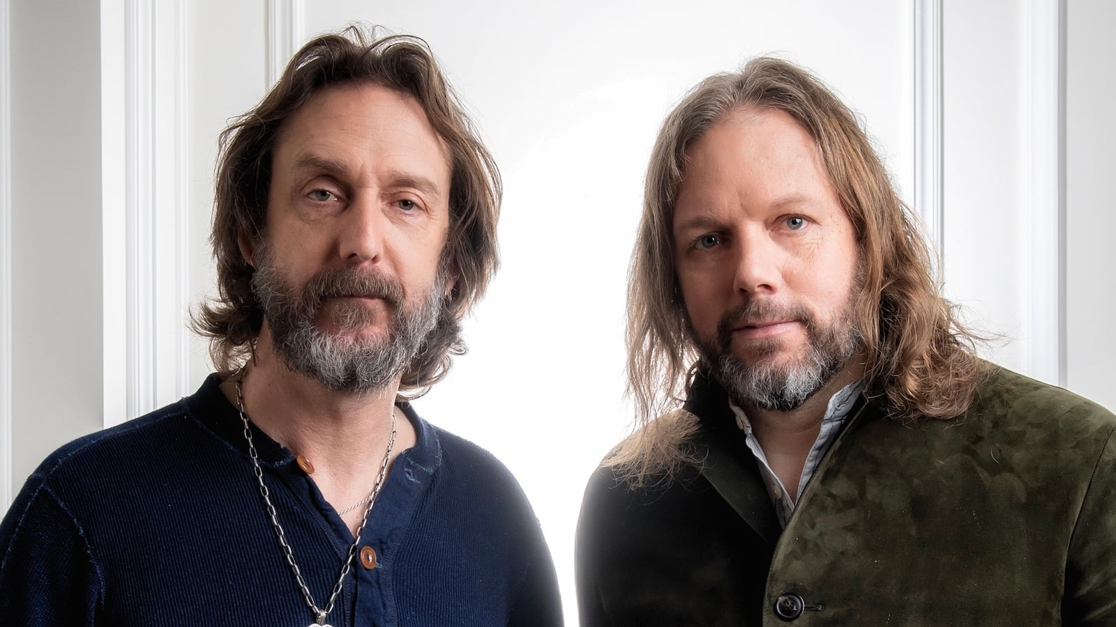 Rich Robinson (R) and Chris Robinson of The Black Crowes pose for a portrait session at the Langham Hotel on February 13, 2020 in London, England.
