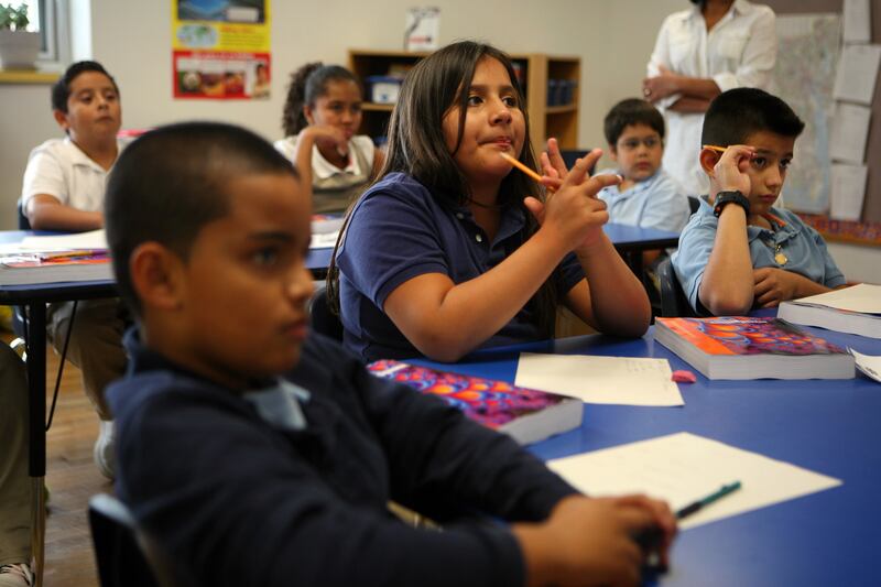 articles/2014/01/22/gop-strategists-to-party-hug-more-black-kids/140122-bouie-school-choice-tease_jyfwtg