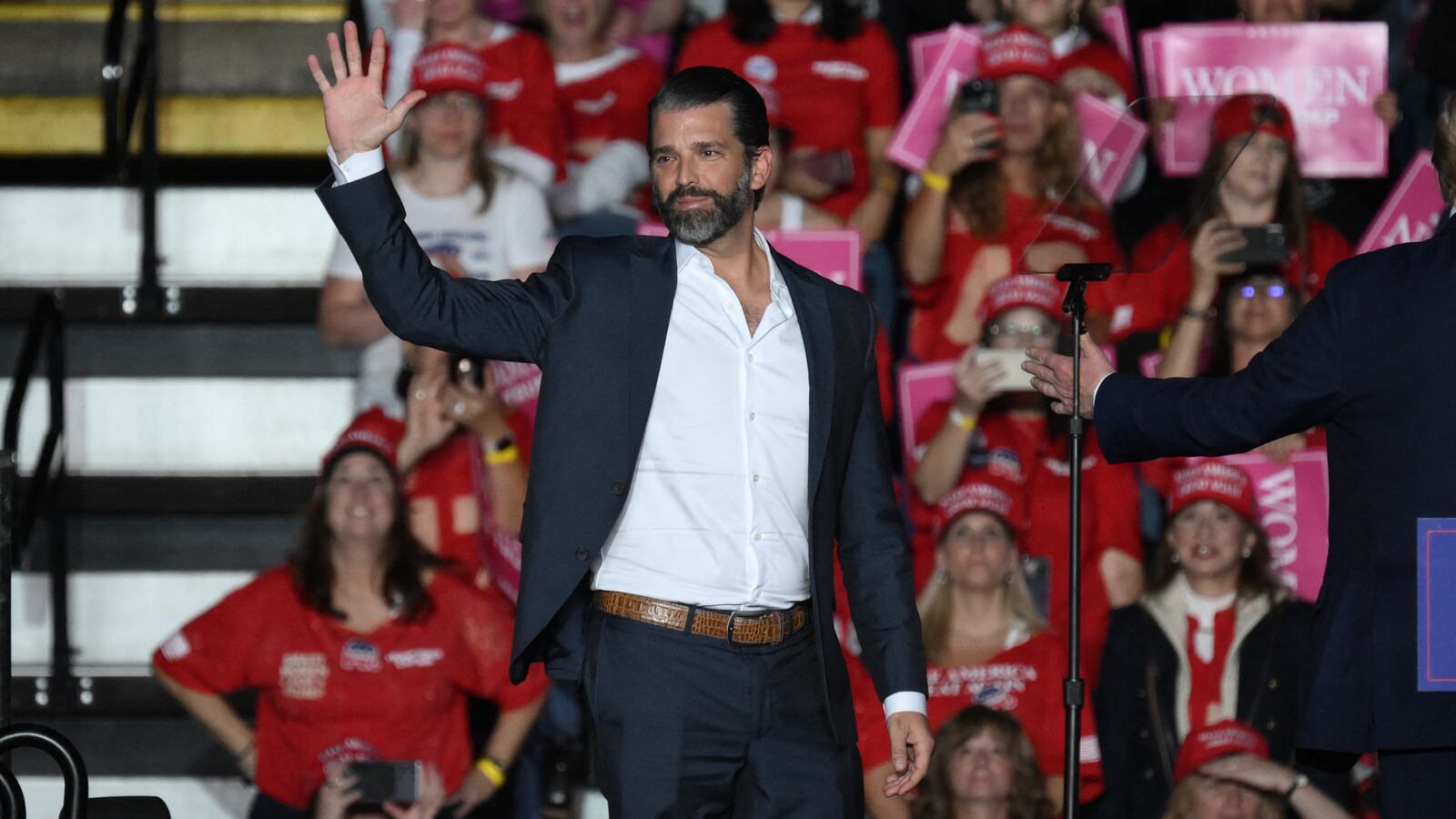 Don Trump Jr. arrives to speak at a campaign rally of his father former US President and Republican presidential candidate Donald Trump at the Santander arena in Reading, Pennsylvania, on November 4, 2024.