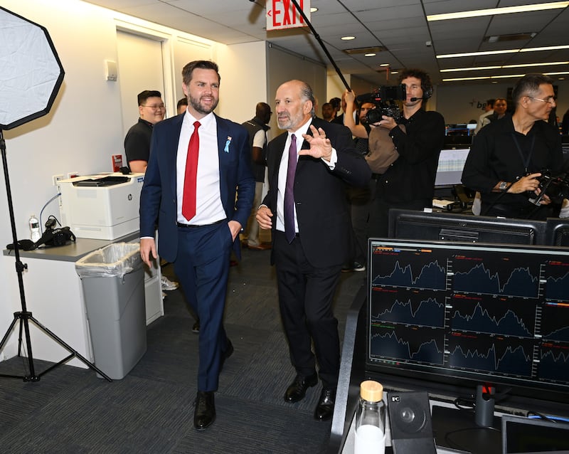 NEW YORK, NEW YORK - SEPTEMBER 11: (L-R) JD Vance and Howard Lutnick attend Charity Day 2024 hosted by The Cantor Fitzgerald Relief Fund at BGC Group on September 11, 2024 in New York City.  (Photo by Dave Kotinsky/Getty Images for The Cantor Fitzgerald Relief Fund)