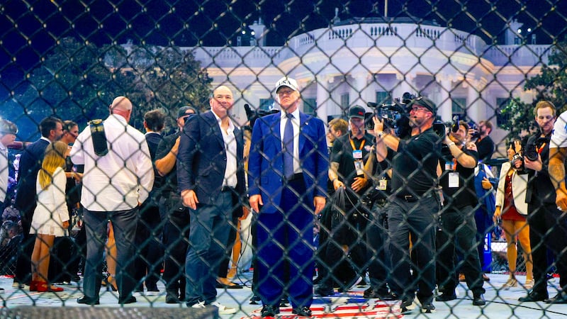 U.S. President Donald Trump and UFC CEO Dana White  stand on the Octagon at UFC Freedom 250 on the South Lawn of the White House in Washington, D.C., U.S., June 15, 2026.