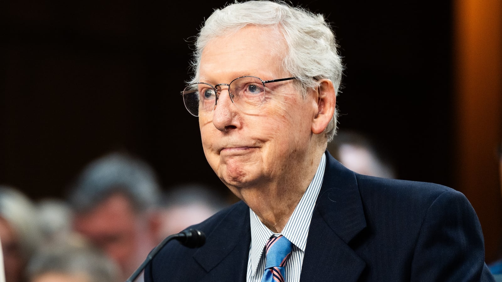 Sen. Mitch McConnell was seen falling in the basement of the Senate Russell Building on Thursday while being asked about ICE by a member of The Sunrise Movement.