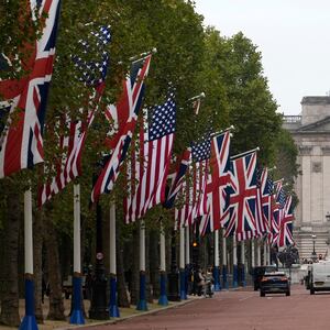 Union and Stars and Stripes flags fly on The Mall, on September 18, 2025, during the second State Visit of US President Donald Trump. After the royal hospitality and pageantry, US President Donald Trump's unprecedented second state visit to the UK takes a serious turn on Thursday when he is hosted by Prime Minister Keir Starmer for wide-ranging talks. (Photo by CARLOS JASSO / AFP) (Photo by CARLOS JASSO/AFP via Getty Images)