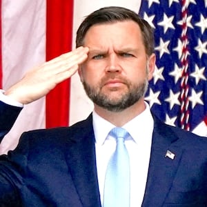 U.S. President Donald Trump and U.S. Vice President JD Vance salute in the Memorial Amphitheater during a Memorial Day event at Arlington National Cemetery, Arlington, Virginia, U.S., May 25, 2026.