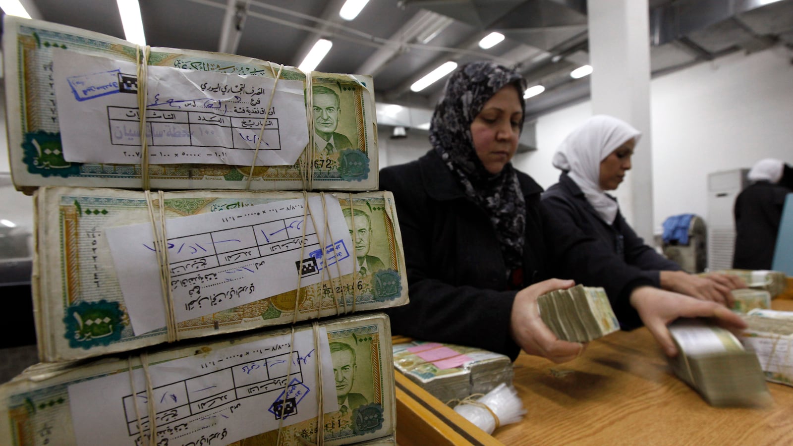 articles/2013/04/08/in-syria-follow-the-money-to-find-the-roots-of-the-revolt/130407-Rafizadeh-Syria-tease_th65xg