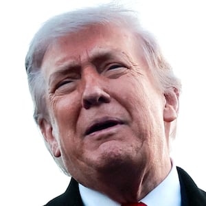 U.S. President Donald Trump looks on as he speaks to reporters near the Lincoln Memorial Reflecting Pool as it undergoes renovations, in Washington, D.C., U.S., May 7, 2026.