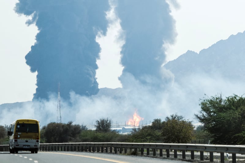 Smoke and flames rise from an energy installation in the Gulf emirate of Fujairah on March 14, 2026. Smoke could be seen rising from the direction of a major UAE energy installation on March 14, in what appeared to be the latest strike targeting the Gulf's petroleum facilities hours after the US struck Iran's Kharg Island.