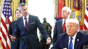 U.S. Secretary of Transportation Sean Duffy speaks alongside Roger Penske, Chair of the Penske Corporation, and U.S. President Donald Trump