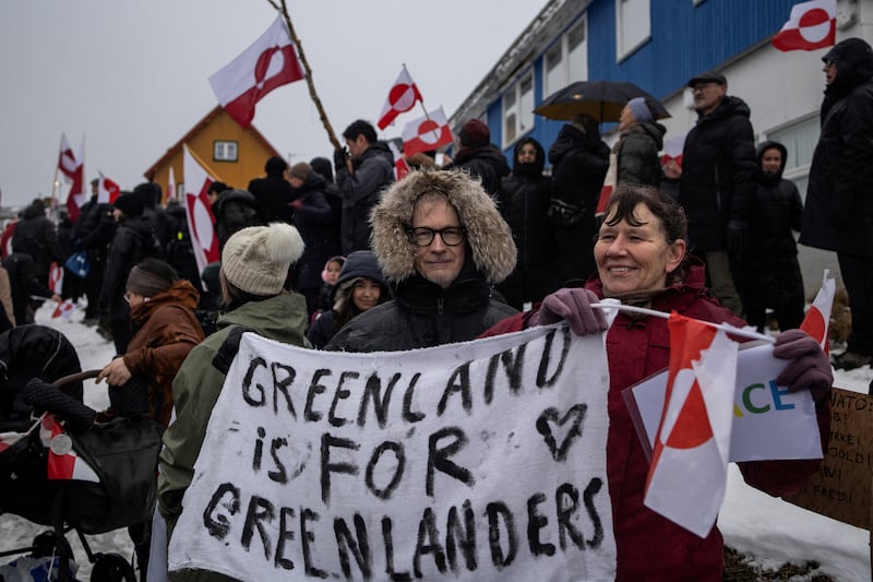 People attend a protest against U.S. President Donald Trump's demand that the Arctic island be ceded to the U.S., calling for it to be allowed to determine its own future, in front of the U.S. consulate in Nuuk, Greenland, January 17, 2026.