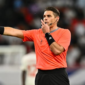 Australian referee Shaun Evans gestures during the qualification 3rd round for the FIFA World Cup 2026 group A match between Qatar and United Arab Emirates at Ahmad Bin Ali Stadium in Al Rayyan, Qatar, on September 5, 2024. (Photo by Noushad Thekkayil/NurPhoto via Getty Images)