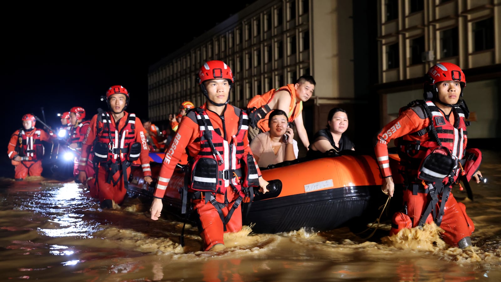 Rescue workers evacuate residents after local reservoirs dam breached due to Typhoon Maysak on July 6, 2026 in Hengzhou, Nanning, Guangxi Zhuang Autonomous Region of China. Local authorities are organizing the evacuation of residents in affected areas of Hengzhou City in Guangxi.