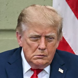 Trump fought off sleep during the solemn event.