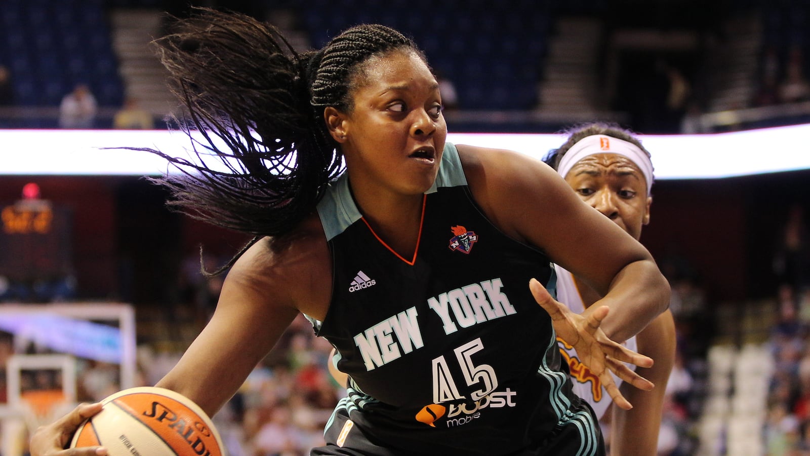 Kara Braxton, New York Liberty, drives to the basket