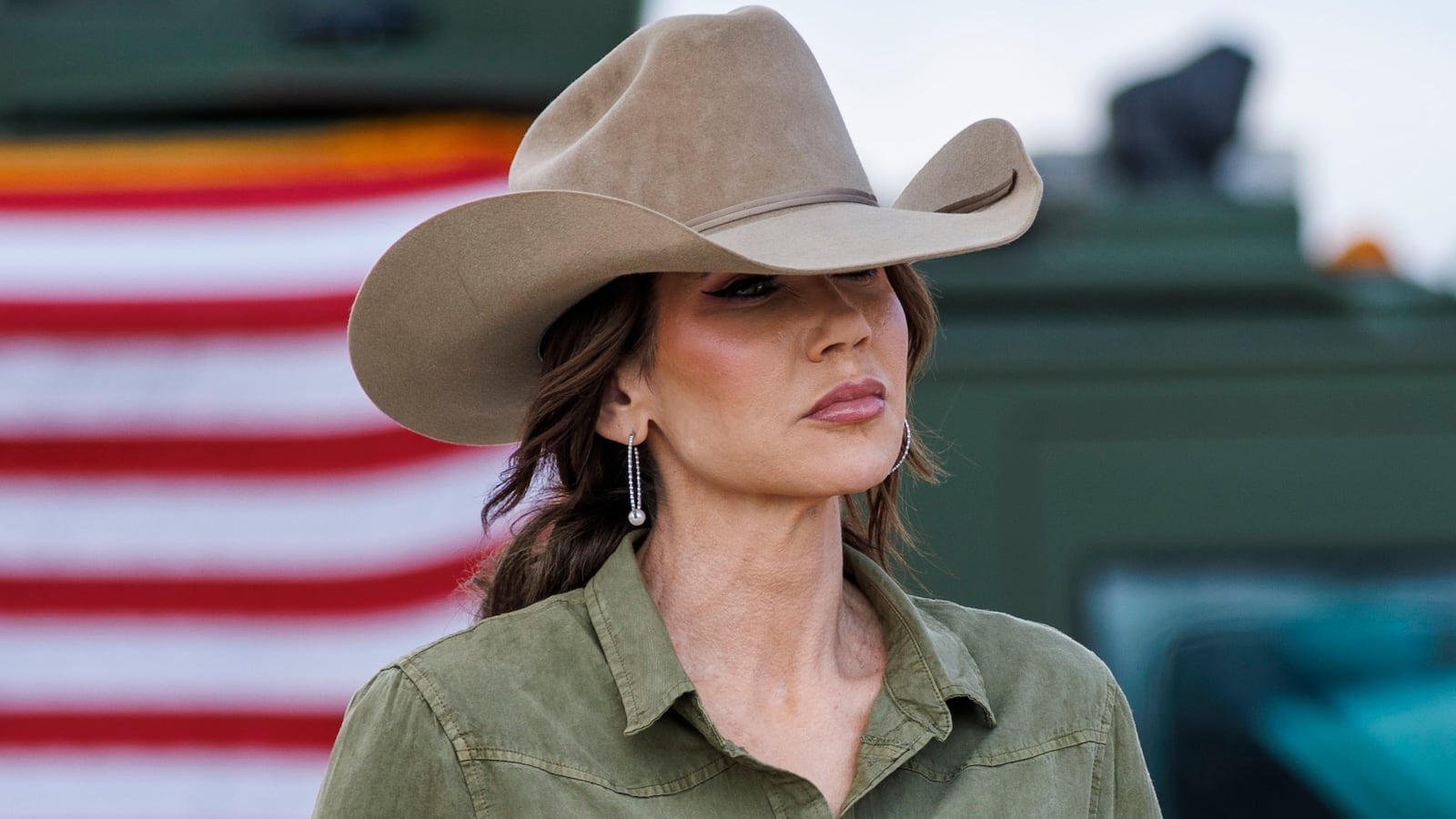 Secretary of Homeland Security Kristi Noem stands alongside U.S. Border Patrol Rio Grande Valley Sector Chief Jared Ashby, left, and U.S. Border Patrol Chief Mike Banks at a news conference on January 7, 2026 in Brownsville, Texas.