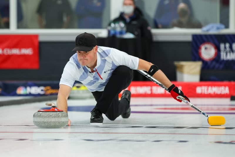 EVELETH, MN - OCTOBER 31: Rich Ruohonen of the United States throws during the Mixed Doubles Olympic Trials final at Curl Mesabi Curling Club on October 31, 2021 in Eveleth, Minnesota. Christopher Plys and Vicky Persinger of the United States defeated Rich Ruohonen and Jaime Sinclair 7-6. (Photo by David Berding/Getty Images)