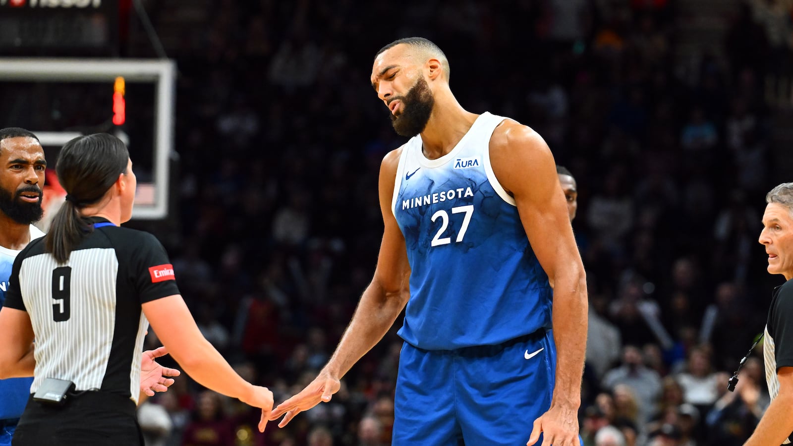 Rudy Gobert #27 of the Minnesota Timberwolves reacts after being called for a technical foul by referee Natalie Sago #9 during the fourth quarter against the Cleveland Cavaliers at Rocket Mortgage Fieldhouse on March 08, 2024 in Cleveland, Ohio.