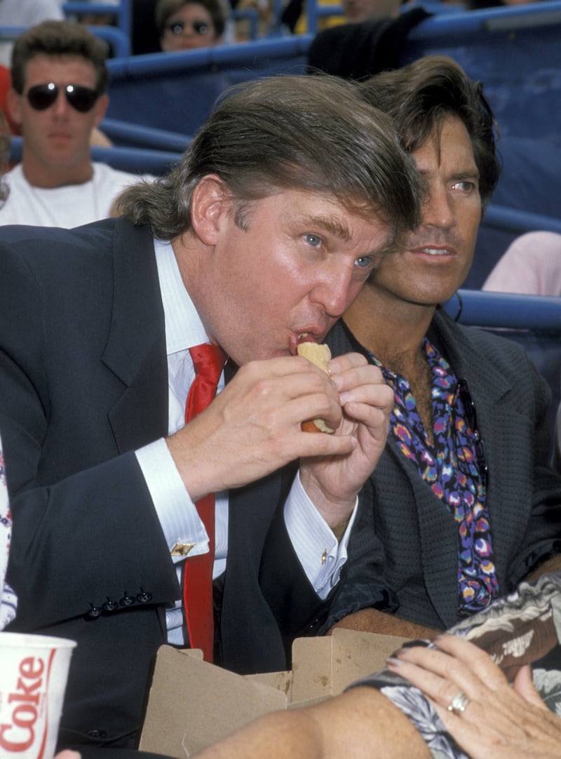 Donald Trump chows down during the 1989 US Open.