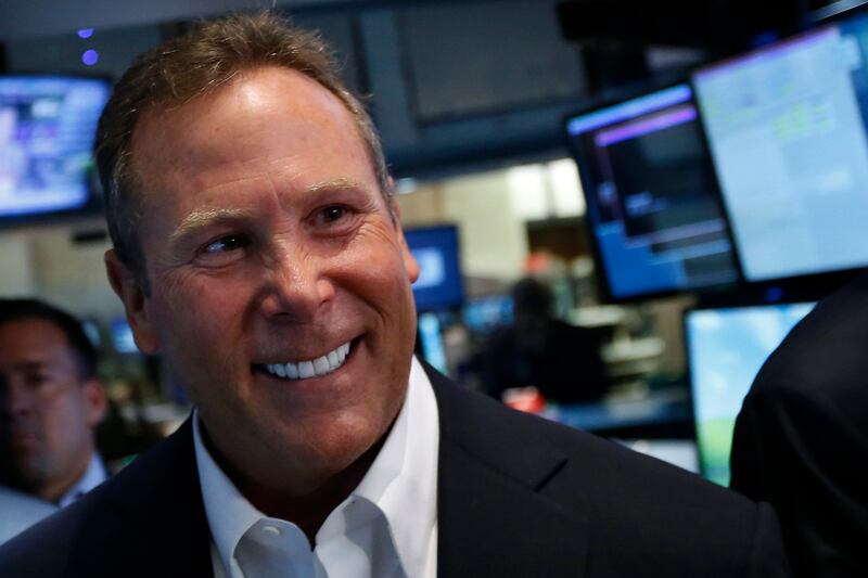 Stephen Cloobeck, chairman and chief executive officer of Diamond Resorts International Inc., reacts following his company's IPO on the floor at the New York Stock Exchange, July 19, 2013. Shares of Diamond Resorts International Inc. rose as much as 5 percent in their market debut after Diamond Resorts' initial public offering priced well below the expected range. The shares touched a high of $15 in early trading on the New York Stock Exchange, valuing the Las Vegas-based company at $1.09 billion. REUTERS/Brendan McDermid (UNITED STATES  - Tags: BUSINESS)