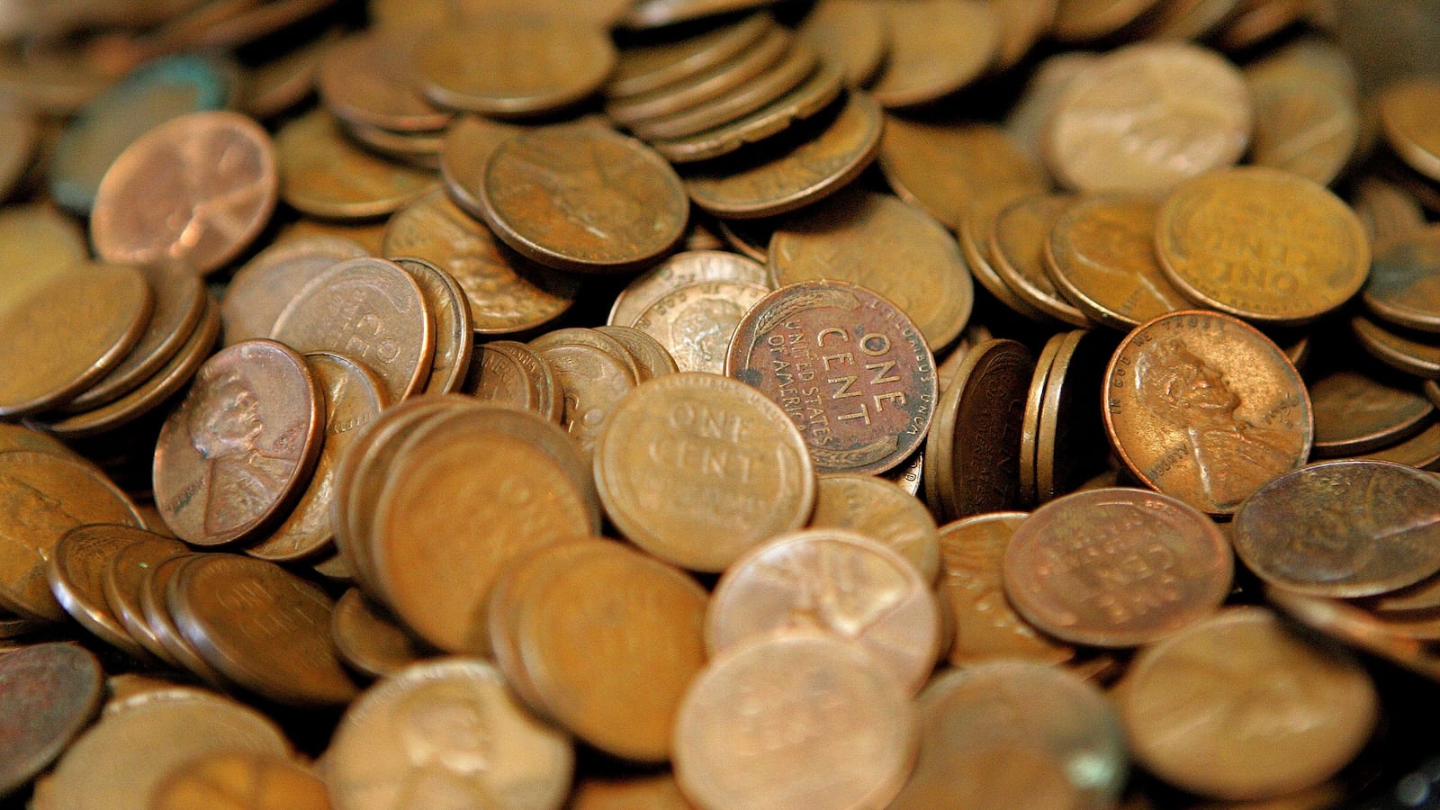 GLENVIEW, IL - JULY 06: Pennies are displayed at Glenview Coin & Collectibles July 6, 2006 in Glenview, Illinois. Reportedly due to manufacturing costs, the US Mint may be contemplating discontinuing the penny. (Photo by Tim Boyle/Getty Images)