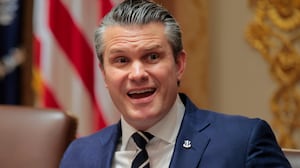 U.S. Secretary of War Pete Hegseth (R) speaks alongside U.S. President Donald Trump during a Cabinet meeting in the Cabinet Room of the White House on March 26, 2026 in Washington, DC.