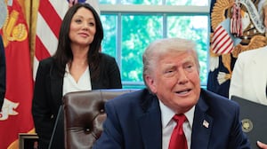 President Donald Trump speaks to the media as Secretary of Labor Lori Chavez-DeRemer look on after signing executive orders in the Oval Office at the White House on April 23, 2025 in Washington, DC.