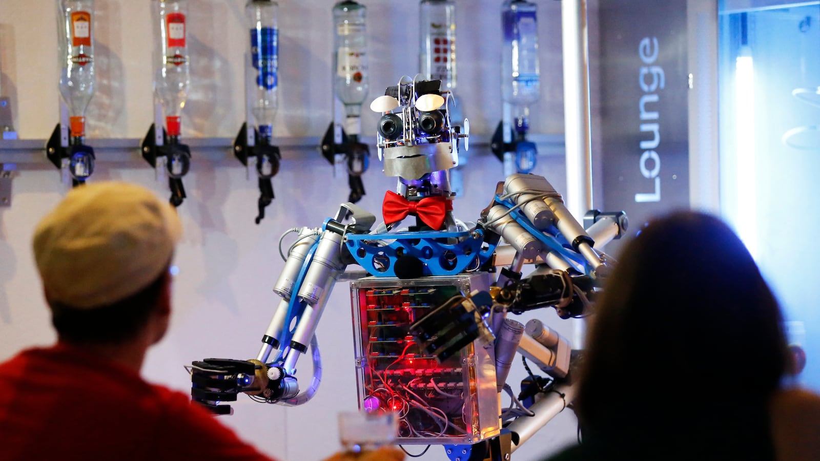 articles/2014/10/25/how-much-do-you-tip-a-robot-bartender/141024-kulp-robot-bar-tease_vb6n2w
