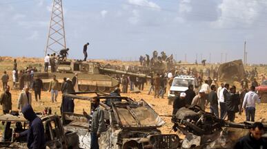 articles/2011/03/22/america-owns-the-war-in-libya-whether-we-like-it-or-not/carter-libya-1_168439_nfnzsr