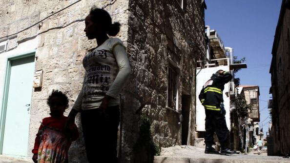 articles/2012/09/21/on-african-refugees-and-jewish-heartlessness/eritrean-woman-in-jerusalem-openz_byyjtr