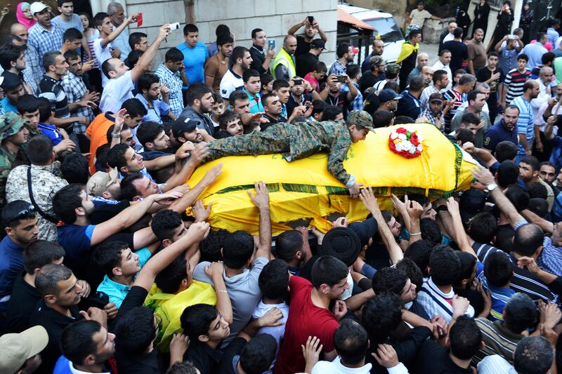 articles/2014/08/01/hezbollah-s-widening-war-spreads-to-iraq/140731-dettmer-hezbollah-embed_wflqnz