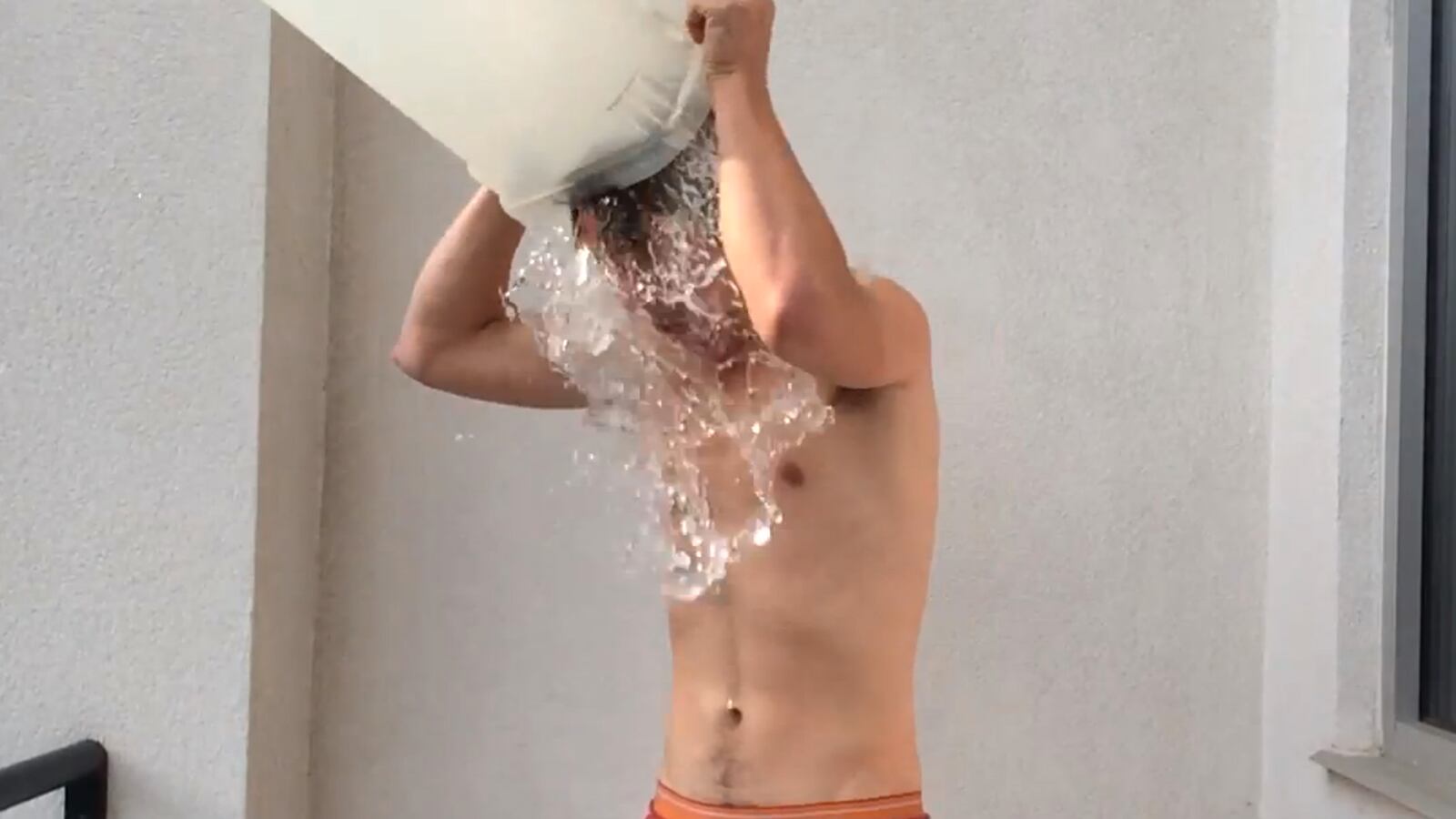 articles/2014/08/11/the-ice-bucket-challenge-celebrities-promote-als-awareness-washboard-abs/140811-ansel-elgort-tease-alt_r4x9yb