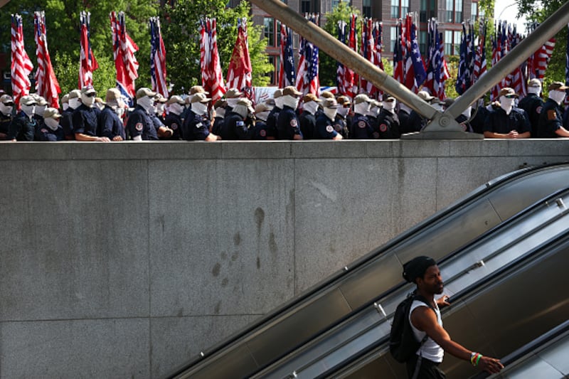Members of the white supremacist group Patriot Front gather at Eastern Market metro station on July 04, 2026