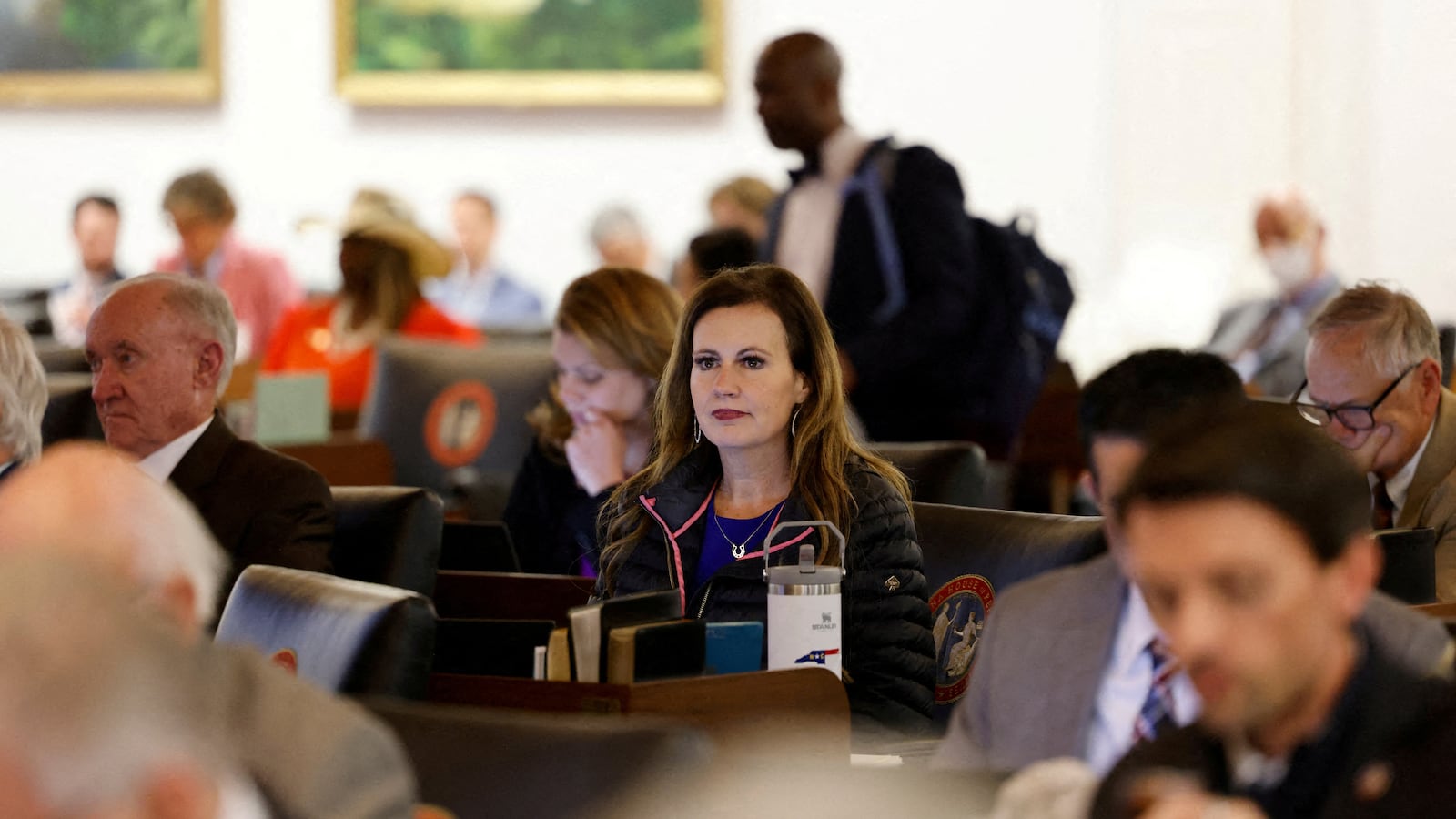 Tricia Cotham, whose recent defection from the Democratic Party handed its opponents a super majority, sits with fellow Republicans in North Carolina’s House of Representatives.