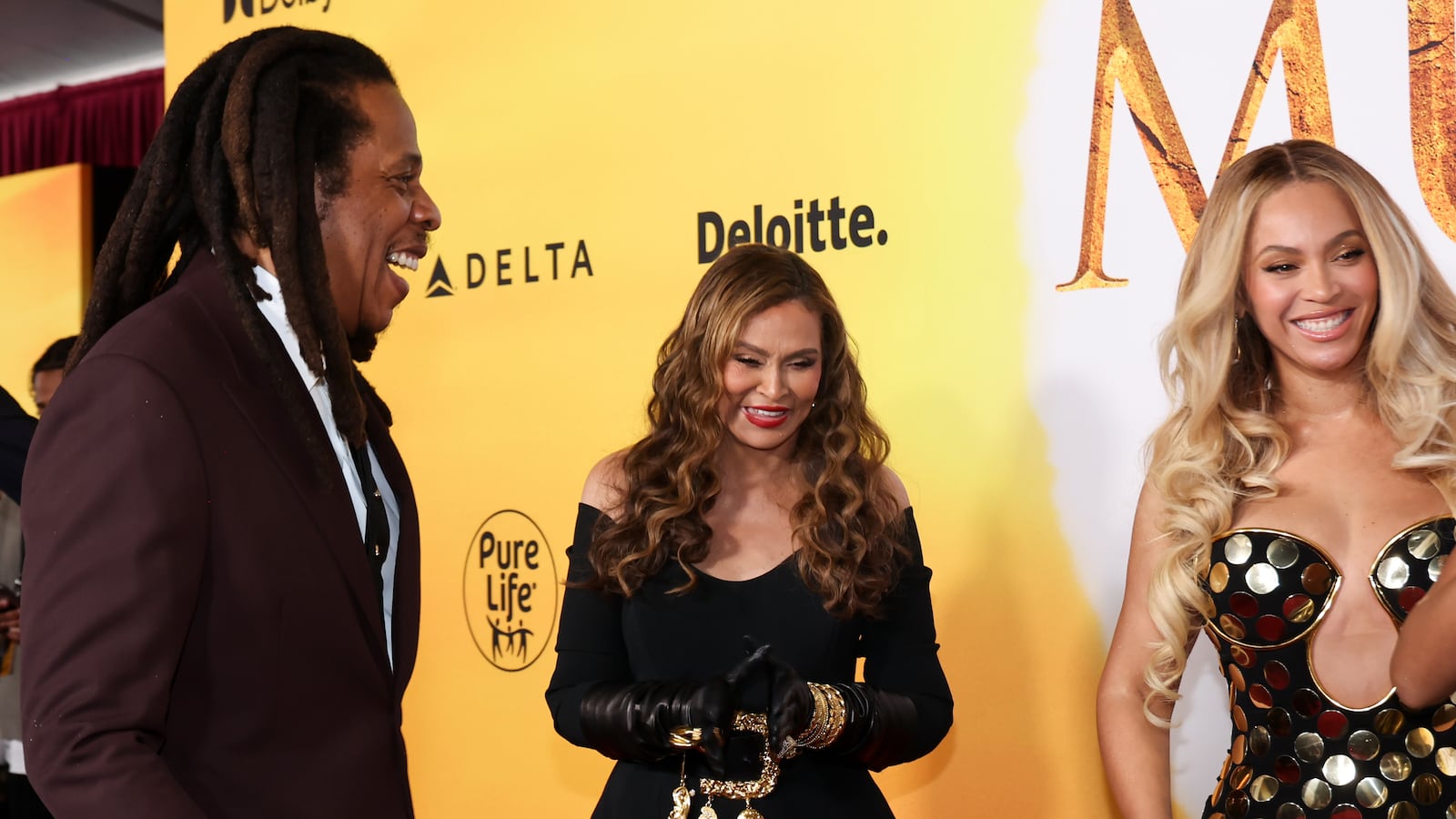 HOLLYWOOD, CALIFORNIA - DECEMBER 09: (L-R) Jay-Z, Tina Knowles and Beyoncé attend the Los Angeles premiere of Disney's "Mufasa: The Lion King" at Dolby Theatre on December 09, 2024 in Hollywood, California. (Photo by Amy Sussman/WireImage)